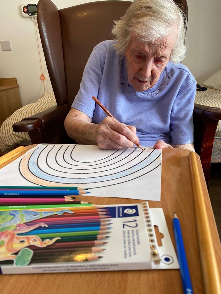 Creating rainbows to cheer up passer's by.